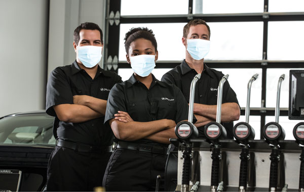 Jiffy Lube car experts wearing mask