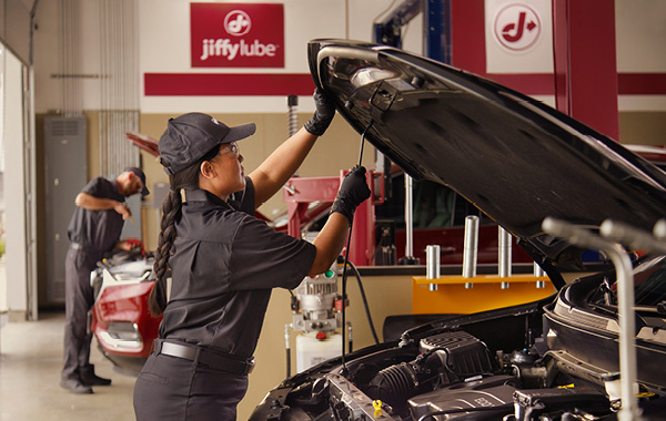 Auto mechanics at work